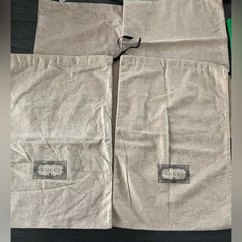 Set of 4 small Gucci dustbags